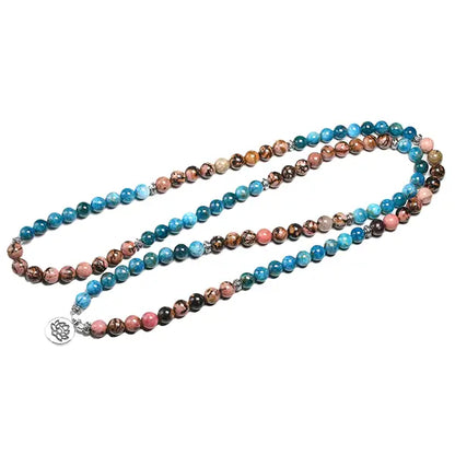 Mala 108 perles Apatite Rhodonite Fleur de Lotus deroulé dessus kaosix